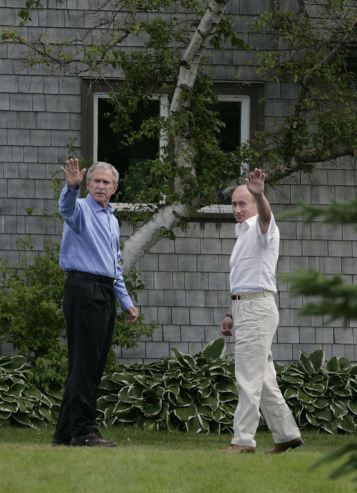 President George W. Bush and Russia's President Vladimir Putin wave as they leave a press availability Monday, July 2, 2007, at Walker's Point in Kennebunkport, Me. White House photo by Joyce N. Boghosian