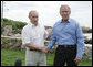 President George W. Bush and President Vladimir Putin of Russia, shake hands at the end of their joint press availability Monday, July 2, 2007, at Walker's Point in Kennebunkport, Me. Said President Bush, "We had a good, casual discussion on a variety of issues. We had a very long, strategic dialogue that I found to be important, necessary and productive." White House photo by Joyce N. Boghosian