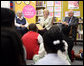 Mrs. Lynne Cheney speaks to students from Ambassador Baptist Christian School, Wednesday, July 11, 2007, at the Anacostia Interim Public Library in Washington, D.C. During Mrs. Cheney's visit the National Endowment for the Humanities announced that all D.C. public libraries will receive this year's We the People Bookshelf, a collection of classic books with themes related to American ideas and ideals. Seated with Mrs. Cheney are Chief Librarian of the D.C. Public Libraries Ginnie Cooper and Chairman of the National Endowment for the Humanities Bruce Cole. White House photo by David Bohrer