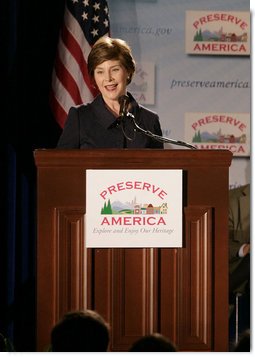 Mrs. Laura Bush addresses her remarks at the Preserve America grants presentation Thursday, July 12, 2007, at the Cannon House Office Building at the U.S. Capitol in Washington, D.C., honoring communities that use their historic assets to educate visitors and local residents about their town's important links to our nation's past. Mrs. Bush also took the occassion to honor the memory of former First Lady Lady Bird Johnson, remembered for her love of America's environment and history. White House photo by Shealah Craighead