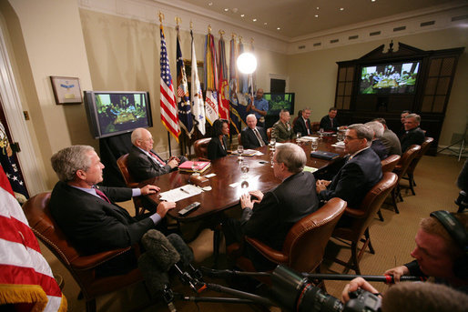 President George W. Bush meets with members of his National Security team Friday, July 13, 2007, in the Roosevelt Room at the White House during a video teleconference with Iraq Provincial Recontsruction Team Leaders, Embedded Provincial Reconstruction Team Leaders and Brigade Combat Commanders. White House photo by Eric Draper