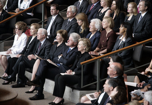 Mrs. Laura Bush, first row-center, joins former President Jimmy Carter and his wife, Rosalynn; former President Bill Clinton, and his wife, Hillary Clinton; Mrs. Nancy Reagan; Caroline Kennedy Schlossberg, her husband Edwin Schlossberg; Mrs. Barbara Bush; Susan Ford Bales, daughter of former President Gerald R. Ford; and Patricia "Tricia" Nixon Cox and her husband, Edward Cox, upper-right, at the funeral service for former first lady Lady Bird Johnson Saturday, July 14, 2007, at the Riverbend Centre in Austin, Texas. White House photo by Shealah Craighead