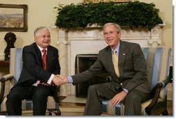 President George W. Bush welcomes Polish President Lech Kaczynski to the Oval Office Monday, July 16, 2007, where the two leaders met to discuss economic and mutual security issues. White House photo by Joyce N. Boghosian
