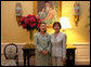 Mrs. Laura Bush hosts a tea for Mrs. Yoo Soon-taek, wife of U.N. Secretary General, Ban Ki-moon, Tuesday, July 17, 2007, in the White House residence. White House photo by Shealah Craighead