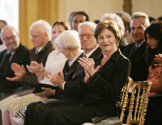 Mrs. Laura Bush, seated next to design award recipient Robert Venturi, applauds the winners of the 2007 Cooper-Hewitt National Design Awards Wednesday, July 18, 2007, in the East Room of the White House. White House photo by Shealah Craighead