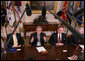 President George W. Bush gestures as he speaks to members of the media Wednesday, July 18, 2007 in the Roosevelt Room at the White House, following a meeting with the Import Safety working group, where President Bush announced an updated review of the food safety regulations and inspection procedures will be conducted to ensure the nation's food supply remains the safest in the world. White House photo by Eric Draper