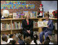 Mrs. Laura Bush, joined by U.S. Secretary of Education Margaret Spellings, reads to children at the Driggs School in Waterbury, Conn., Tuesday, July 24, 2007. Mrs. Bush also announced the 2007 Improving Literacy through School Libraries grants being awarded by the U.S. Department of Education. White House photo by Shealah Craighead
