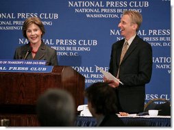Mrs. Laura Bush participates in a question and answer session after addressing the National Press Club Wednesday, July 25, 2007 in Washington D.C. Mrs. Bush, joined by National Press Club President Jerry Zremski, talked about inspiring stories of what people are doing to help those with HIV/AIDS. "But certainly one of the most moving parts is the work that so many groups are doing on ground in Africa," said Mrs. Bush. "(Bruce Wilkinson, Director of the RAPIDS Consortium), have a donor who has given 23,000 bicycles to Zambia, so that the care-givers that we met can literally go door to door in their neighborhoods and find out who needs help." White House photo by Shealah Craighead
