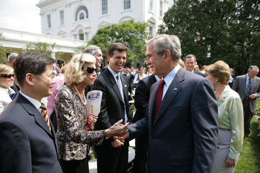 President George W. Bush greets Eunice Kennedy Shriver, the founder of Special Olympics, during a Special Olympics Global Law Enforcement Torch Run Ceremony Thursday, July 26, 2007, in the Rose Garden. The Special Olympics Law Enforcement Torch Run was begun in 1981 in Wichita, Kansas, by Police Chief Richard LaMunyon. Since then the torch run has expanded to all 50 states and 35 nations. This years marks the first Global Special Olympics Law Enforcement Torch Run. White House photo by Eric Draper