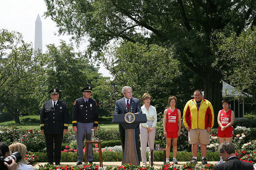 President George W. Bush speaks during a Special Olympics Global Law Enforcement Torch Run Ceremony Thursday, July 26, 2007, in the Rose Garden. "And to the family members and coaches and supporters, I thank you for helping our fellow citizens understand that the promise of this country belongs to every citizen," said the President. "Over four decades, the Special Olympics has changed the lives of millions of people across the world." White House photo by Joyce N. Boghosian