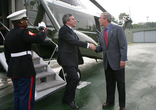 President George W. Bush welcomes Prime Minister Gordon Brown of the United Kingdom to Camp David, Maryland, Sunday, July 29, 2007. White House photo by Eric Draper