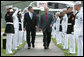 President George W. Bush and Prime Minister Gordon Brown of the United Kingdom, walk past an honor guard Sunday, July 29, 2007, after the Prime Minister's arrival at Camp David in Thurmont, Maryland. White House photo by Chris Greenberg