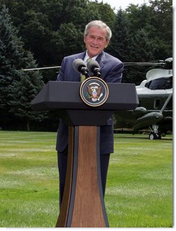 President George W. Bush addresses the press during a joint press availability with British Prime Minister Gordon Brown Monday, July 30, 2007, at Camp David near Thurmont, Md. White House photo by Chris Greenberg