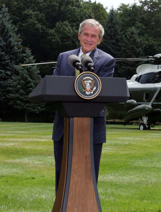 President George W. Bush addresses the press during a joint press availability with British Prime Minister Gordon Brown Monday, July 30, 2007, at Camp David near Thurmont, Md. White House photo by Chris Greenberg