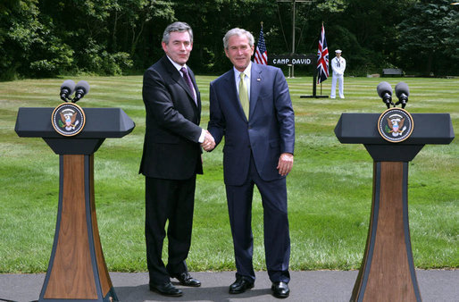 President George W. Bush and British Prime Minister Gordon Brown stand together during their joint press availability Monday, July 30, 2007, at Camp David near Thurmont, Md. "So everybody is wondering whether or not the Prime Minister and I were able to find common ground, to get along, to have a meaningful discussion. And the answer is, absolutely," said President Bush. White House photo by Chris Greenberg