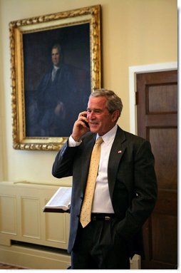 President George W. Bush congratulates San Francisco Giants' Barry Bonds in a phone call from the U.S. Department of the Treasury, Wednesday, Aug. 8. 2007. Mr. Bonds hit his record-breaking 756th home run during last night's game against the Washington Nationals in San Francisco. White House photo by Chris Greenberg