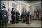 President George W. Bush stands with his economic advisors as he delivers a statement to the press Wednesday, Aug. 8, 2007, at the U.S. Department of Treasury in Washington, D.C. "Since 2003, our economy has added more than 8.3 million new jobs and almost four years of uninterrupted growth," said President Bush. "We continue to grow at a steady pace, and during the most recent quarter, it grew at an annual rate of 3.4 percent." White House photo by Chris Greenberg