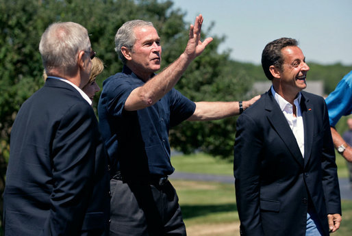 President George W. Bush waves to the press as he welcomes President Nicolas Sarkozy of France to Walker’s Point Saturday, August 11, 2007, in Kennebunkport, Maine. White House photo by Shealah Craighead