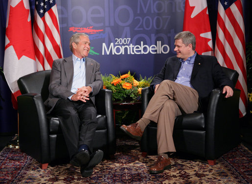 President George W. Bush meets with Canadian Prime Minster Stephen Harper during the North American Leaders' Summit Monday, Aug. 20, 2007, in Montebello, Canada. White House photo by Eric Draper