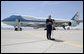 President George W. Bush, speaking to members of the media Monday, Aug. 27, 2007 on the tarmac of Kirtland Air Force Base, New Mexico, praised Iraqi leaders for agreeing to establish new power-sharing agreements, their commitment to support political initiatives, and advances agreement among Iraq's leadership on several key legislative benchmarks. White House photo by Chris Greenberg