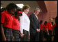 President George W. Bush and Mrs. Laura Bush join students and facility at the Dr. Martin Luther King Jr. Charter School for Science and Technology in a moment of silence marking the second anniversary of Hurricane Katrina, Wednesday, Aug. 29, 2007, in New Orleans. White House photo by Shealah Craighead