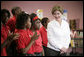Mrs. Laura Bush thanks students for their applause as she is introduced during her visit with President George W. Bush to the Dr. Martin Luther King Jr. Charter School for Science and Technology,Wednesday, Aug. 29, 2007, in New Orleans. White House photo by Shealah Craighead