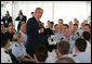 President George W. Bush addresses members of the Australian Defense Force during a luncheon Wednesday on Garden Island in Sydney. The President told the troops, "I believe we are writing one of the great chapters in the history of liberty and peace.So I want to thank you." White House photo by Eric Draper