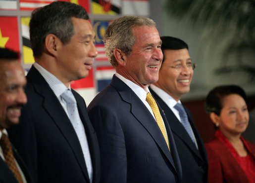 President George W. Bush smiles as he stands for a group photo with Southeast Asian Leaders Friday, Sept. 7, 2007, following a luncheon at the InterContinental in Sydney. Standing with him are Prime Minister Lee Hsien Loong of Singapore, left, Noer Hassan Wirajuda, Indonesian Minister of Foreign Affairs, and President Gloria Macapagal-Arroyo of the Philippines. White House photo by Eric Draper