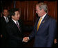 President George W. Bush welcomes President Roh Moo-hyun of the Republic of Korea, to a meeting Friday, Sept. 7, 2007, at the InterContinental hotel in Sydney. President Bush told his counterpart, ".When we have worked together, we have shown that it's possible to achieve the peace on the Korean Peninsula that the people long for. So thank you, sir." White House photo by Eric Draper