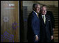 President George W. Bush is welcomed to the APEC Business Summit by Australia's Prime Minister John Howard Friday, Sept. 7, 2007, at the Sydney Opera House. White House photo by Eric Draper