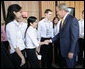 President George W. Bush greets APEC staff outside the Concert Hall at the Sydney Opera House Friday, Sept. 7, 2007, after addressing the APEC Business Summit. White House photo by Eric Draper