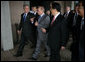 President George W. Bush, President Vladimir Putin of Russia, and President Hu Jintao of the People’s Republic of China, gesture as they walk to the APEC Leaders Retreat Saturday, Sept. 8, 2007, at the Sydney Opera House. White House photo by Eric Draper