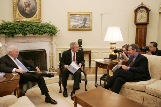 President George W. Bush, joined by Vice President Dick Cheney, meets with Health and Human Services Secretary Michael O. Leavitt in the Oval Office, Monday, Sept. 10, 2007, to talk about the Interagency Working Group on Import Safety's initial report and the group's next steps in enhancing the safety of imported products. White House photo by Joyce N. Boghosian