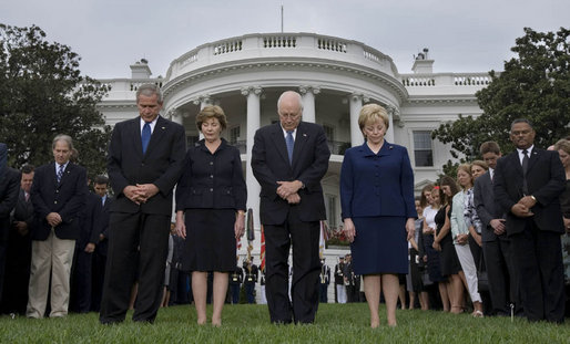 President George W. Bush, Mrs. Laura Bush, Vice President Dick Cheney and Mrs. Lynne Cheney bow their heads for a moment of silence on the South Lawn of the White House Tuesday, Sept. 11, 2007, in memory of those whose lives were lost on Sept. 11, 2001. White House photo by Chris Greenberg