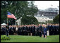 President George W. Bush and Mrs. Laura Bush are joined by Vice President Dick Cheney and Mrs. Lynne Cheney Tuesday, Sept. 11, 2007, on the South Lawn of the White House for a moment of silence in memory of those who died Sept. 11, 2001. White House photo by David Bohrer