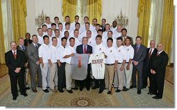 President George W. Bush stands with members of Oregon State University Baseball Team Championship Team Friday, Sept. 21, 2007, at the White House during a photo opportunity with the 2006 and 2007 NCAA Sports Champions. White House photo by Eric Draper