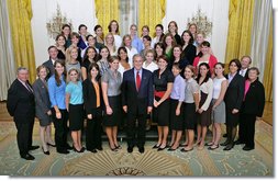 President George W. Bush stands with members of Brown University Women's Crew Championship Team Friday, Sept. 21, 2007, at the White House during a photo opportunity with the 2006 and 2007 NCAA Sports Champions. White House photo by Eric Draper