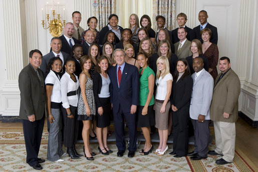 President George W. Bush stands with members of Arizona State University Women's Indoor & Outdoor Track and Field Championship Team Friday, Sept. 21, 2007, at the White House during a photo opportunity with the 2006 and 2007 NCAA Sports Champions. White House photo by Chris Greenberg