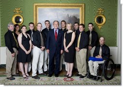 President George W. Bush stands with members of the University of Alaska-Fairbanks Men's and Women's Rifle Championship Team Friday, Sept. 21, 2007, at the White House during a photo opportunity with the 2006 and 2007 NCAA Sports Champions. White House photo by Chris Greenberg