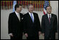 President George W. Bush participates in an official greeting with Secretary General Ban Ki-moon, right, and Dr. Srgjan Kerim, President of the General Assembly, after arriving Tuesday, Sept. 25, 2007, at the United Nations Headquarters in New York City. White House photo by Eric Draper