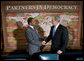 President George W. Bush shakes hands with Tanzania President Jakaya Mrisho Kikweta during their participation in a Roundtable on Democracy Tuesday, Sept. 25, 2007, at the United Nations in New York. White House photo by Eric Draper