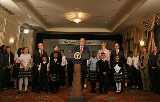 President George W. Bush discusses the reauthorization of No Child Left Behind Wednesday, Sept. 26, 2007, in New York. Those standing with President Bush include New York Mayor Michael Bloomberg, far left, Mrs. Laura Bush and students from New York Public School 76. "The No Child Left Behind Act is working. I say that because the Nation's Report Card says it's working," said President Bush. "Scores are improving, in some instances hitting all-time highs." White House photo by Shealah Craighead