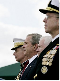 President George W. Bush attends an Armed Forces farewell tribute in honor of U.S. Marine General Peter Pace, left, and Armed Forces hail in honor of Navy Admiral Michael Mullen, right, joined by Secretary of Defense Robert Gates, Monday, October 1, 2007 at Fort Myer, Va. General Pace is retiring after serving two years as Chairman and four years as Vice Chairman of the Joint Chiefs of Staff. White House photo by Eric Draper