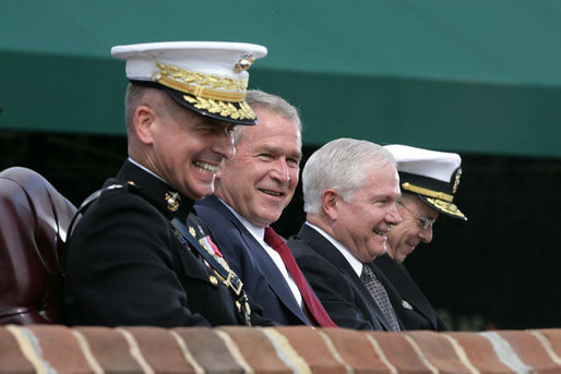 President George W. Bush attends an Armed Forces farewell tribute in honor of Marine General Peter Pace, left, and Armed Forces hail in honor of Navy Admiral Michael Mullen, far right, joined by Secretary of Defense Robert Gates, Monday, October 1, 2007 at Fort Myer, Virginia. General Pace is retiring after serving two years as Chairman and four years as Vice Chairman of the Joint Chiefs of Staff. White House photo by David Bohrer
