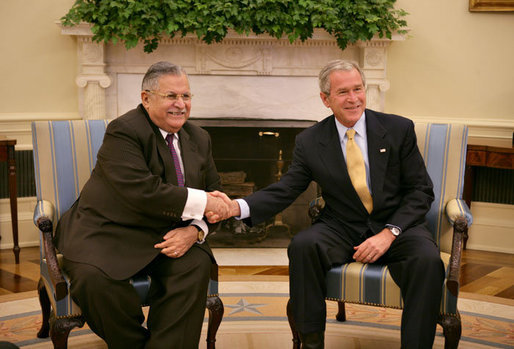 President George W. Bush and President Jalal Talabani of Iraq, shake hands Tuesday, Oct. 2, 2007, as they meet in the Oval Office. White House photo by Eric Draper
