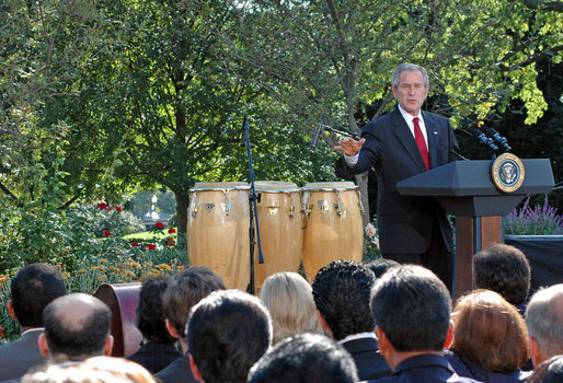 President George W. Bush delivers remarks during a celebration of Hispanic Heritage Month Wednesday, Oct. 10, 2007, in the Rose Garden. “Hispanic Americans strengthen our nation with their commitments to familia y fe (family and faith),” said the President. “Hispanic Americans enrich our country with their talents and creativity and hard work. Hispanic Americans are living the dream that has drawn millions to our shores -- and we must ensure that the American Dream remains available for all.” White House photo by Grant Miller