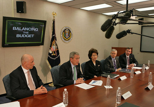 President George W. Bush meets with his economic advisors Thursday, Oct. 11, 2007, in the New Executive Office Building in Washington, D.C. "The deficit today is at 1.2 percent of GDP, which is lower than the average of the last 40 years. In other words, we have told the American people that by keeping taxes low we can grow the economy, and by working with Congress to set priorities we can be fiscally responsible and we can head toward balance," said President Bush in a statement to the press. "And that's exactly where we're headed." White House photo by Chris Greenberg
