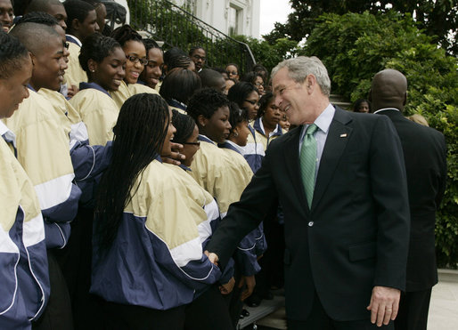 President George W. Bush meets with members of the Ballou High School Marching Band of Washington, D.C., following a photo with the band on the South Portico of the White House Thursday, Oct. 11, 2007, prior to a screening of Ballou: A Documentary Film, about the band’s inspiring accomplishments for the students and the school. White House photo by Shealah Craighead