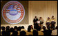 Mrs. Laura Bush is joined on stage by Ballou High School Marching Band Director Darrell Watson, left, band members Lewis Franklin, Rhia Hardman and Kenneth Horne, right, as she addresses students and guests at the White House Thursday, Oct. 11, 2007, prior to a screening of Ballou: A Documentary Film, about the Washington, D.C. band’s inspiring accomplishments. Mrs. Bush said, “Mr. Darrell Watson epitomizes the core message of the Helping America’s Youth initiative-that caring adults can have a powerful impact on the lives of our nation’s youth.” White House photo by Shealah Craighead