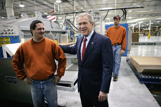 President George W. Bush meets with employees at Stribling Packaging Inc., Monday, Oct. 15, 2007 in Rogers, Ark., during a tour of the facility that specializes in the design of corrugated boxes and point-of-purchase displays. White House photo by Eric Draper